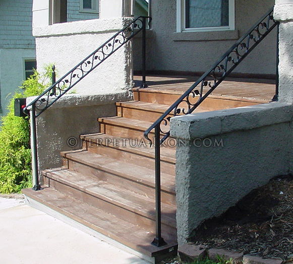 Design in an band, S scroll with leaves, railing for steps, wrought-iron.